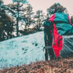 gray and red hiking backpack